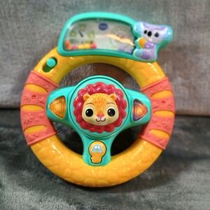 Interactive Grip and Go Steering Wheel Toy with Lion Sounds Songs Lights